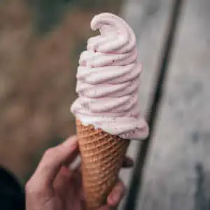Everything You Need To Know About Soft Serve Ice Cream - pink soft serve cone